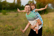 © Svetlana - Beautiful little girl hugging embracing her father in summer