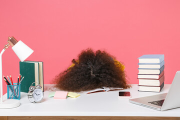 Canvas Print - Tired sleeping african american girl employee in office sit work at desk isolated on pink background. Achievement business career. Education in school university college concept. Put head on table.