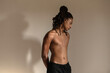 © Lucas Ottone/Stocksy - Multiracial young man