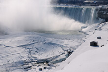 Canadian Horseshoe Falls At Niagara Falls Ontario With Sheets Of Fractured Ice In Winter