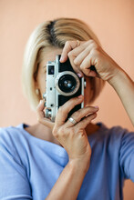 Blonde Woman Taking A Picture