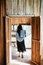 Woman Walking In Farmhouse