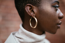 Black woman with shiny earring