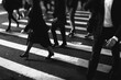 © simon/Stocksy - Crowd of commuters on the zebra crossing