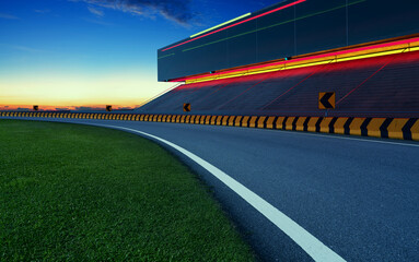 Wall Mural - Evening view of empty asphalt racing track