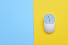 Modern Computer Mouse On Color Background