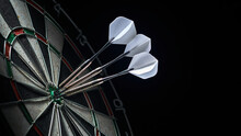 3 Darts In The Center Of The Dartboard