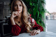 © Olena_Molchanova - woman with glass of white wine in cafe or restaurant. sexy young blonde girl