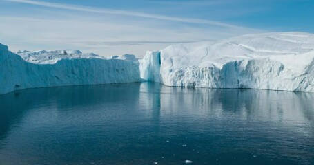 Wall Mural - climate change - greenland iceberg landscape of ilulissat icefjord with giant icebergs. timelapse hy