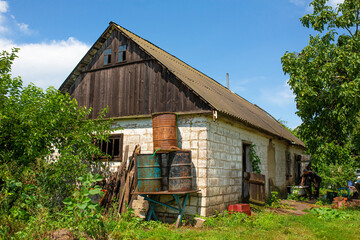 Wall Mural - An old abandoned house in a distant village.