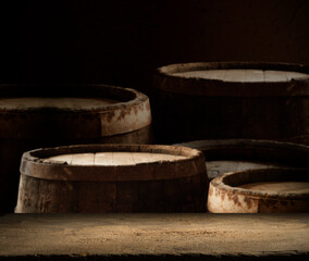 Wall Mural - Old wooden barrel on a brown background