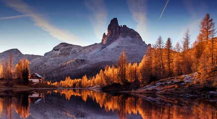 Fotobehang - The beautiful nature landscape. Great view on Federa Lake early in the morning. The Federa lake with the Dolomites peak, Cortina D'Ampezzo, South Tyrol, Dolomites, Italy. popular travel locations.