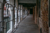 Fototapeta Uliczki - The light and shadows in the empty narrow alleys of Venice  during the coronavirus