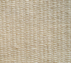 Canvas Print - New woven ecru woolen rug close