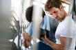 Healthy life and gym exercise concept. Fit man working out in sport fitness club