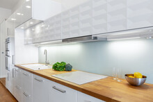 Elegant White Kitchen With Led Lights