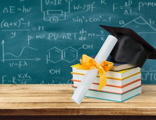 Poster - School books and graduation hat on desk, education concept