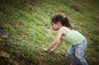© ellinnur - Portrait of a toddler walking outdoor. Enjoying nature.