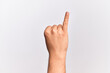 © Krakenimages.com - Hand of caucasian young man showing fingers over isolated white background showing little finger as pinky promise commitment, number one