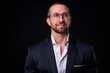 © Ranta Images - Portrait of handsome bearded businessman with eyeglasses