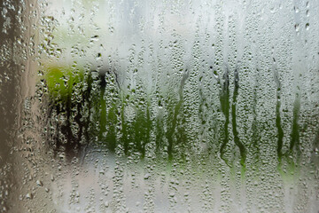 natural behind the wet glass