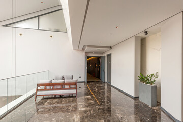 Wall Mural - Interior of a hotel lobby with shiny marble floor