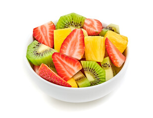 Fruit fresh salad in bowl, diet concept. Healthy salad of mixed fruits strawberry, kiwi, mango, pineapple isolated on white. Dieting health vitamin meal