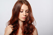 © mikhail_b_azarov - beauty portrait of a young red-haired woman on white background.