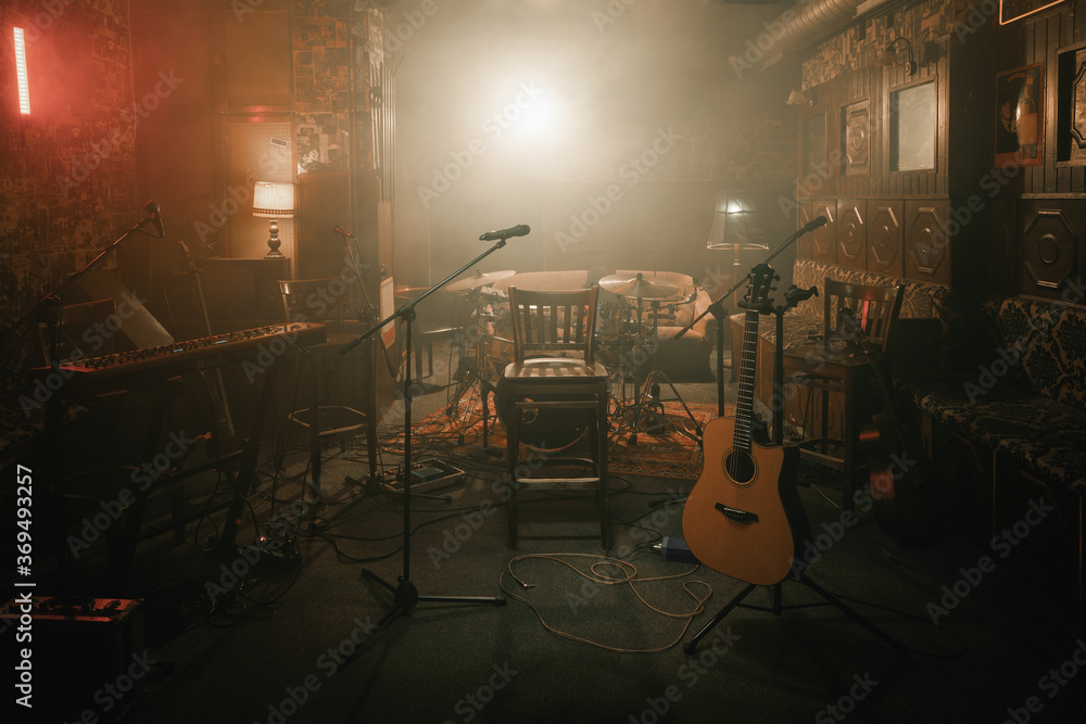 Empty stage of a small unplugged live music concert - obrazy, fototapety, plakaty 