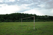 © Andrei - Football goal post in the middle of a poor quality pitch used for amateur games in rural Romania