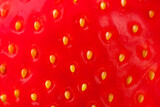 Fototapeta  - Background Of Fresh Berry Of Red Strawberry With Seeds Close Up.