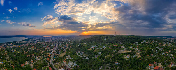 Wall Mural - Stunning aerial panoramic view of sunset over the city Varna, Bulgaria.