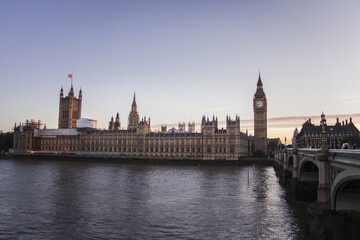 Sticker - Vertical shot of the Big Ben tower and the House of Parliament behind the river Thames in London