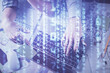 © peshkova - Double exposure of man and woman working together and data theme hologram drawing. Computer background. Top View.