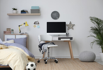 Poster - stylish teenager's room interior with comfortable bed and workplace