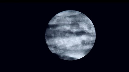 movie of clouds on full moon in the black sky.
