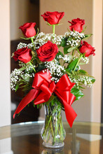 Gorgeous Bright Red Roses Bouquet In Crystal Vase With Baby Breath Flowers