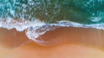 Wall Mural - Aerial view of sea waves, sand and beach