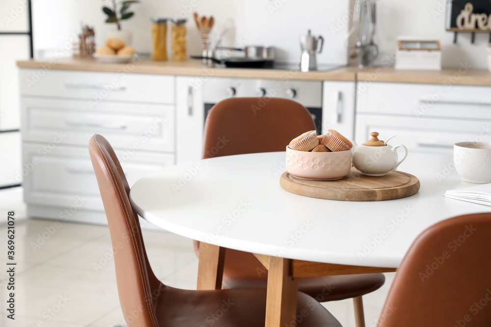 Table Inside Kitchen Dining table in interior of modern kitchen Stock Photo | Adobe Stock