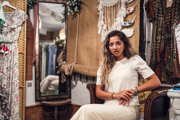 Poster - Tanned Caucasian female with fierce posing at an amusement park