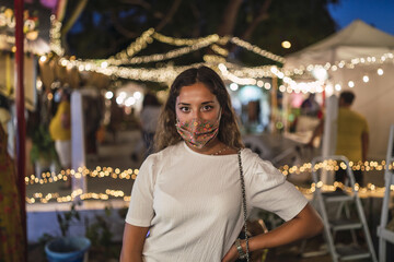 Sticker - Beautiful shot of a young caucasian female with Christmas lights background