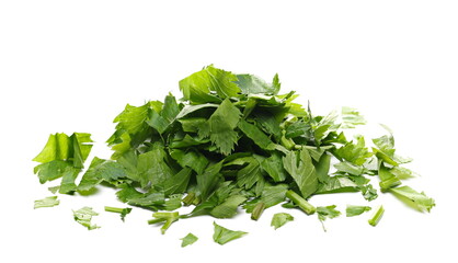 Fresh chopped up celery leaves pile isolated on white background