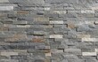 © luca piccini basile - Stone wall cladding made of horizontal gray, brown and white strips of rock stacked . Background and texture