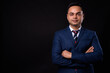 © Ranta Images - Portrait of young handsome Indian businessman in suit