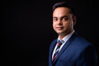 © Ranta Images - Portrait of young handsome Indian businessman in suit