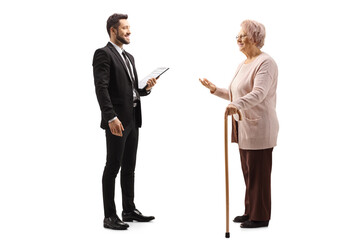 Poster - Elderly woman talking to a young elegant man in a suit