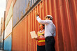© bank215 - site manager explains detail to secretary woman for contraol box container at cargo logistics service