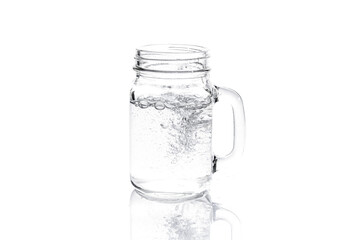 mason jar with water isolated on white