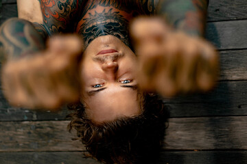 young handsome man in tattoos Close-up portrait.