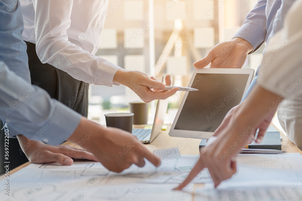 Businessman making presentation with his colleagues and business ...